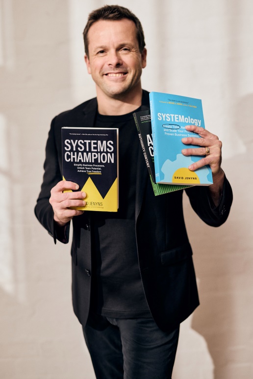 David Jenyns holding SYSTEMology, Systems Champion, and Authority Content books